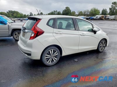 Trzecie zdjęcie samochodu z tyłu: 2019 HONDA FIT EXL VIN:3HGGK5H91KM717470 - miniatura