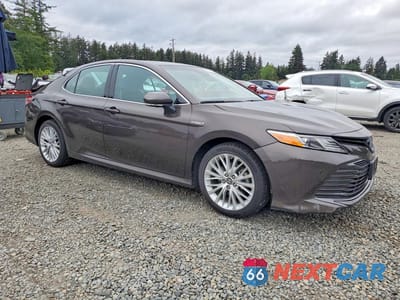 Czwarte zdjęcie samochodu z boku: 2018 TOYOTA CAMRY HYBRID XLE VIN:4T1B21HK0JU503323 - miniatura