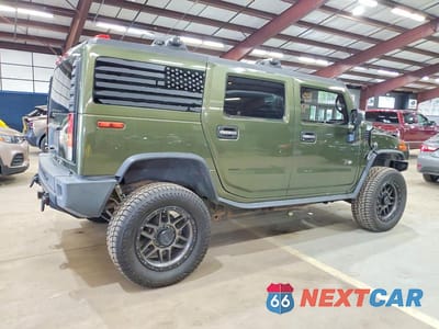 Trzecie zdjęcie samochodu z tyłu: 2003 HUMMER H2 VIN:5GRGN23U33H101063 - miniatura