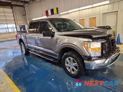 Czwarte zdjęcie samochodu z boku: 2021 FORD F150 SUPERCREW VIN:1FTFW1E86MFC81818 - miniatura