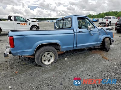 Trzecie zdjęcie samochodu z tyłu: 1990 FORD RANGER VIN:1FTCR10X8LUC06086 - miniatura