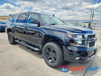 Czwarte zdjęcie samochodu z boku: 2018 CHEVROLET SUBURBAN K1500 LT VIN:1GNSKHKC2JR116992 - miniatura
