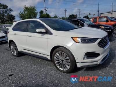 Czwarte zdjęcie samochodu z boku: 2022 FORD EDGE TITANIUM VIN:2FMPK4K93NBA29909 - miniatura