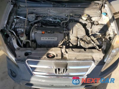 Zdjęcie 12 z 13 samochodu: 2006 HONDA CR-V LX VIN:JHLRD78516C037024 - miniatura