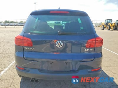 Zdjęcie 6 z 13 samochodu: 2013 VOLKSWAGEN TIGUAN S VIN:WVGAV3AX3DW614039 - miniatura