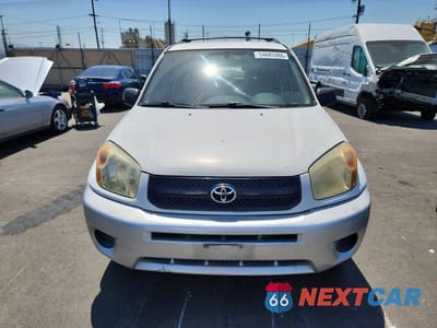Piąte zdjęcie samochodu w środku: 2004 TOYOTA RAV4 BASE VIN:JTEGD20V040006182 - miniatura