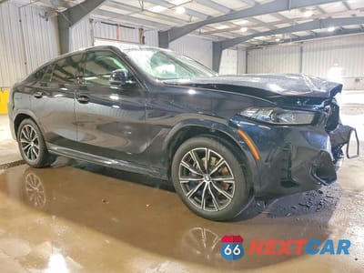 Czwarte zdjęcie samochodu z boku: 2026 BMW X6 XDRIVE40I VIN:5UX33EX06T9395257 - miniatura