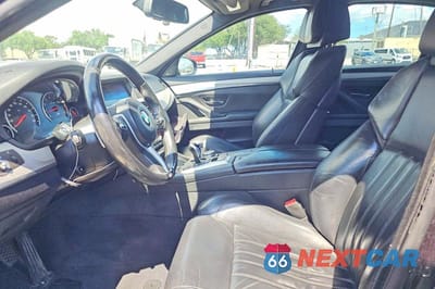 Zdjęcie 12 z 14 samochodu: 2016 BMW M5 VIN:WBSFV9C55GD595740 - miniatura