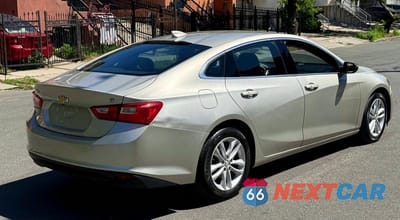 Czwarte zdjęcie samochodu z boku: 2016 CHEVROLET MALIBU LT VIN:1G1ZE5ST8GF232939 - miniatura