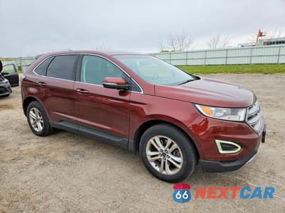 Czwarte zdjęcie samochodu z boku: 2015 FORD EDGE SEL VIN:2FMTK4J98FBB96669 - miniatura