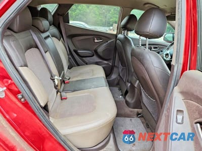 Zdjęcie 11 z 14 samochodu: 2011 HYUNDAI TUCSON GLS VIN:KM8JU3ACXBU120561 - miniatura