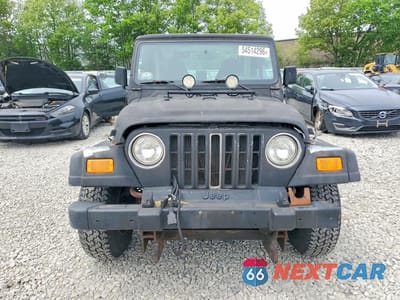 Piąte zdjęcie samochodu w środku: 2000 JEEP WRANGLER / TJ SPORT VIN:1J4FA49S2YP754758 - miniatura