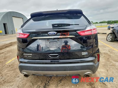 Zdjęcie 6 z 12 samochodu: 2020 FORD EDGE SEL VIN:2FMPK4J90LBA44611 - miniatura