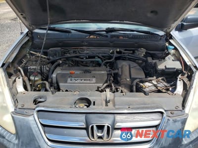 Zdjęcie 12 z 13 samochodu: 2005 HONDA CR-V LX VIN:JHLRD68585C007219 - miniatura