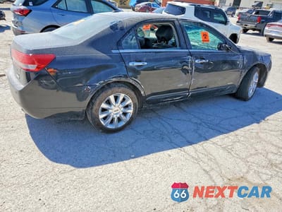 Trzecie zdjęcie samochodu z tyłu: 2012 LINCOLN MKZ HYBRID VIN:3LNDL2L32CR822535 - miniatura