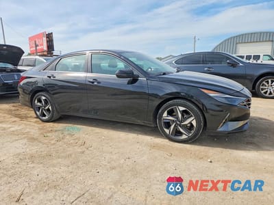 Czwarte zdjęcie samochodu z boku: 2022 HYUNDAI ELANTRA LIMITED VIN:5NPLP4AG2NH072114 - miniatura