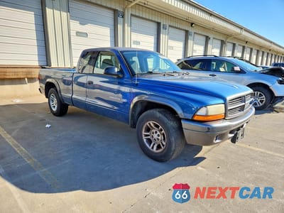 Czwarte zdjęcie samochodu z boku: 2002 DODGE DAKOTA BASE VIN:1B7GL12X42S686119 - miniatura