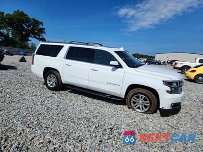 Czwarte zdjęcie samochodu z boku: 2016 CHEVROLET SUBURBAN K1500 LT VIN:1GNSKHKCXGR221837 - miniatura