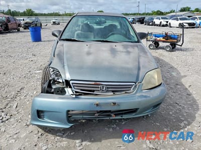 Piąte zdjęcie samochodu w środku: 1999 HONDA CIVIC LX VIN:1HGEJ6678XL020579 - miniatura