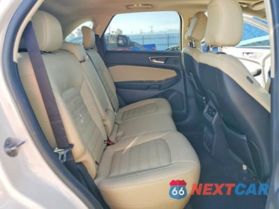 Zdjęcie 11 z 13 samochodu: 2020 FORD EDGE SEL VIN:2FMPK3J94LBA19754 - miniatura