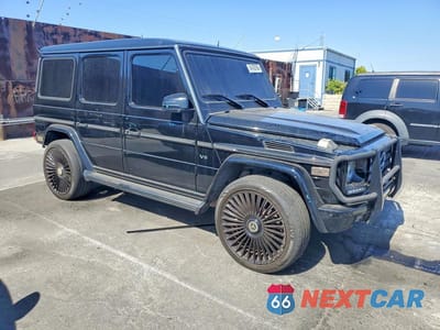 Czwarte zdjęcie samochodu z boku: 2015 MERCEDES-BENZ G 550 VIN:WDCYC3HF0FX232287 - miniatura