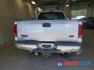 Zdjęcie 6 z 12 samochodu: 1999 FORD F250 SUPER DUTY VIN:1FTNF21L2XEB16824 - miniatura