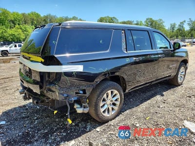 Trzecie zdjęcie samochodu z tyłu: 2023 CHEVROLET SUBURBAN K1500 PREMIER VIN:1GNSKFKD9PR273764 - miniatura