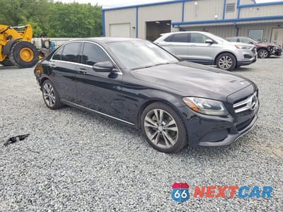 Czwarte zdjęcie samochodu z boku: 2016 MERCEDES-BENZ C 300 VIN:55SWF4JB1GU151259 - miniatura