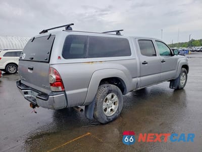Trzecie zdjęcie samochodu z tyłu: 2014 TOYOTA TACOMA V6 VIN:3TMMU4FN5EM070811 - miniatura