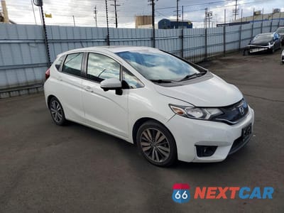 Czwarte zdjęcie samochodu z boku: 2015 HONDA FIT EX VIN:3HGGK5H80FM768732 - miniatura