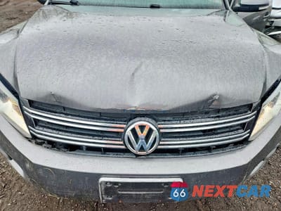 Zdjęcie 11 z 12 samochodu: 2013 VOLKSWAGEN TIGUAN S VIN:WVGAV3AX3DW076023 - miniatura