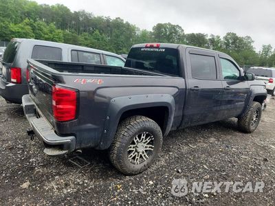 Trzecie zdjęcie samochodu z tyłu: 2014 CHEVROLET SILVERADO K1500 LT VIN:3GCUKREC2EG190664 - miniatura