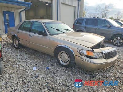 Czwarte zdjęcie samochodu z boku: 1999 MERCURY GRAND MARQUIS LS VIN:2MEFM75W2XX718647 - miniatura