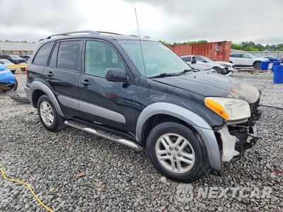 Czwarte zdjęcie samochodu z boku: 2001 TOYOTA RAV4 BASE VIN:JTEGH20V710021374 - miniatura