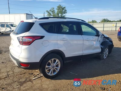 Trzecie zdjęcie samochodu z tyłu: 2018 FORD ESCAPE SE VIN:1FMCU0GD0JUC69597 - miniatura