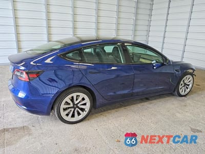 Trzecie zdjęcie samochodu z tyłu: 2022 TESLA MODEL 3 VIN:5YJ3E1EA3NF368929 - miniatura