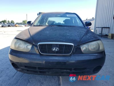 Piąte zdjęcie samochodu w środku: 2002 HYUNDAI ELANTRA GLS VIN:KMHDN45D32U301746 - miniatura