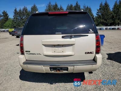 Zdjęcie 6 z 13 samochodu: 2011 GMC YUKON XL DENALI VIN:1GKS2MEF8BR382742 - miniatura