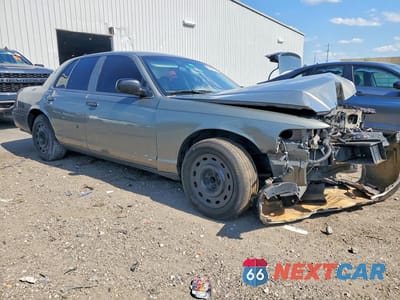 Czwarte zdjęcie samochodu z boku: 2004 MERCURY GRAND MARQUIS GS VIN:2MEFM74W54X692994 - miniatura