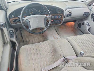 Zdjęcie 8 z 12 samochodu: 1994 PONTIAC BONNEVILLE SE VIN:1G2HX52L3R4242942 - miniatura