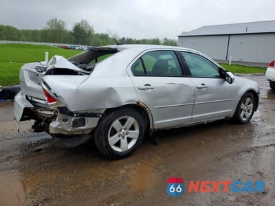 Trzecie zdjęcie samochodu z tyłu: 2009 FORD FUSION SE VIN:3FAHP07109R161500 - miniatura