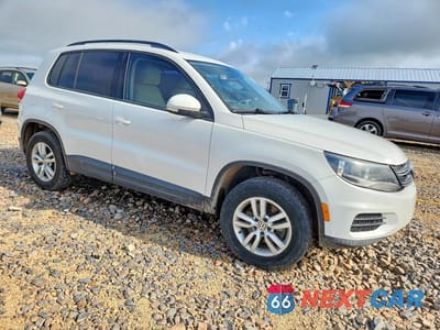 Czwarte zdjęcie samochodu z boku: 2017 VOLKSWAGEN TIGUAN S VIN:WVGAV7AX8HK027467 - miniatura