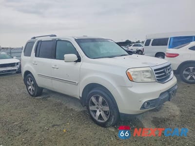 Czwarte zdjęcie samochodu z boku: 2012 HONDA PILOT TOURING VIN:5FNYF4H9XCB062006 - miniatura