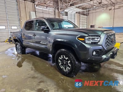 Czwarte zdjęcie samochodu z boku: 2023 TOYOTA TACOMA TRD OFF-ROAD VIN:3TMCZ5AN9PM593293 - miniatura