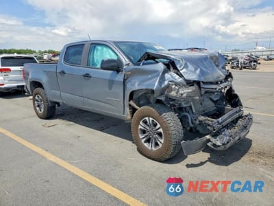 Czwarte zdjęcie samochodu z boku: 2022 CHEVROLET COLORADO Z71 VIN:1GCPTDE17N1180447 - miniatura
