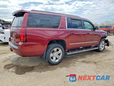 Trzecie zdjęcie samochodu z tyłu: 2019 CHEVROLET SUBURBAN C1500 LT VIN:1GNSCHKC7KR295979 - miniatura