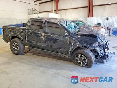 Czwarte zdjęcie samochodu z boku: 2026 GMC CANYON AT4X VIN:1GTP2EEK9T1110866 - miniatura