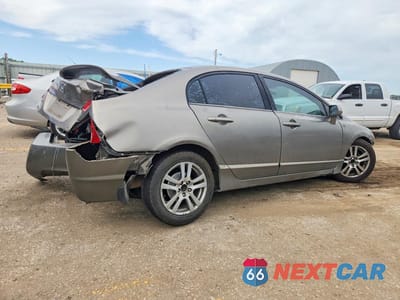 Trzecie zdjęcie samochodu z tyłu: 2006 HONDA CIVIC LX VIN:1HGFA16586L098736 - miniatura