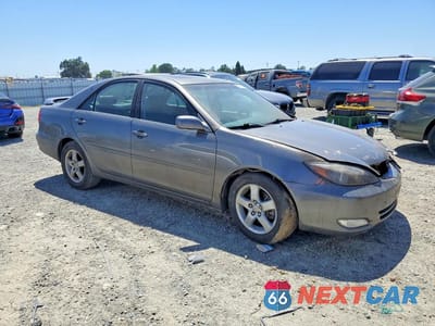 Czwarte zdjęcie samochodu z boku: 2002 TOYOTA CAMRY SE V6 VIN:JTDBF30K420010723 - miniatura