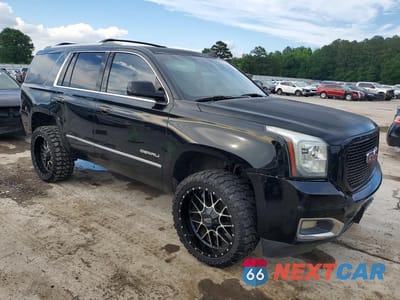 Czwarte zdjęcie samochodu z boku: 2015 GMC YUKON DENALI VIN:1GKS2CKJ6FR660062 - miniatura